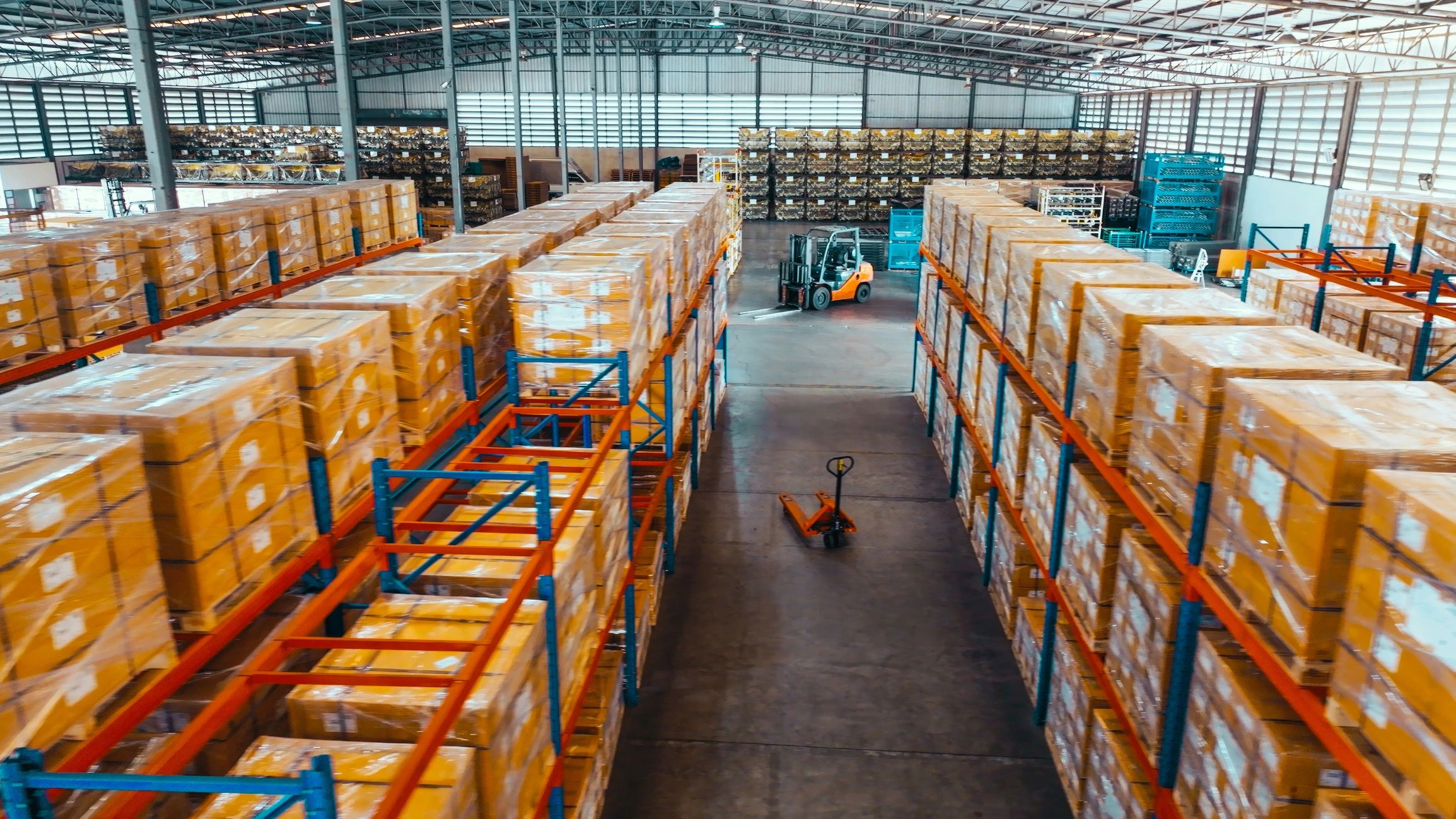 Warehouse shelving and logistics environment representing supply chain visibility