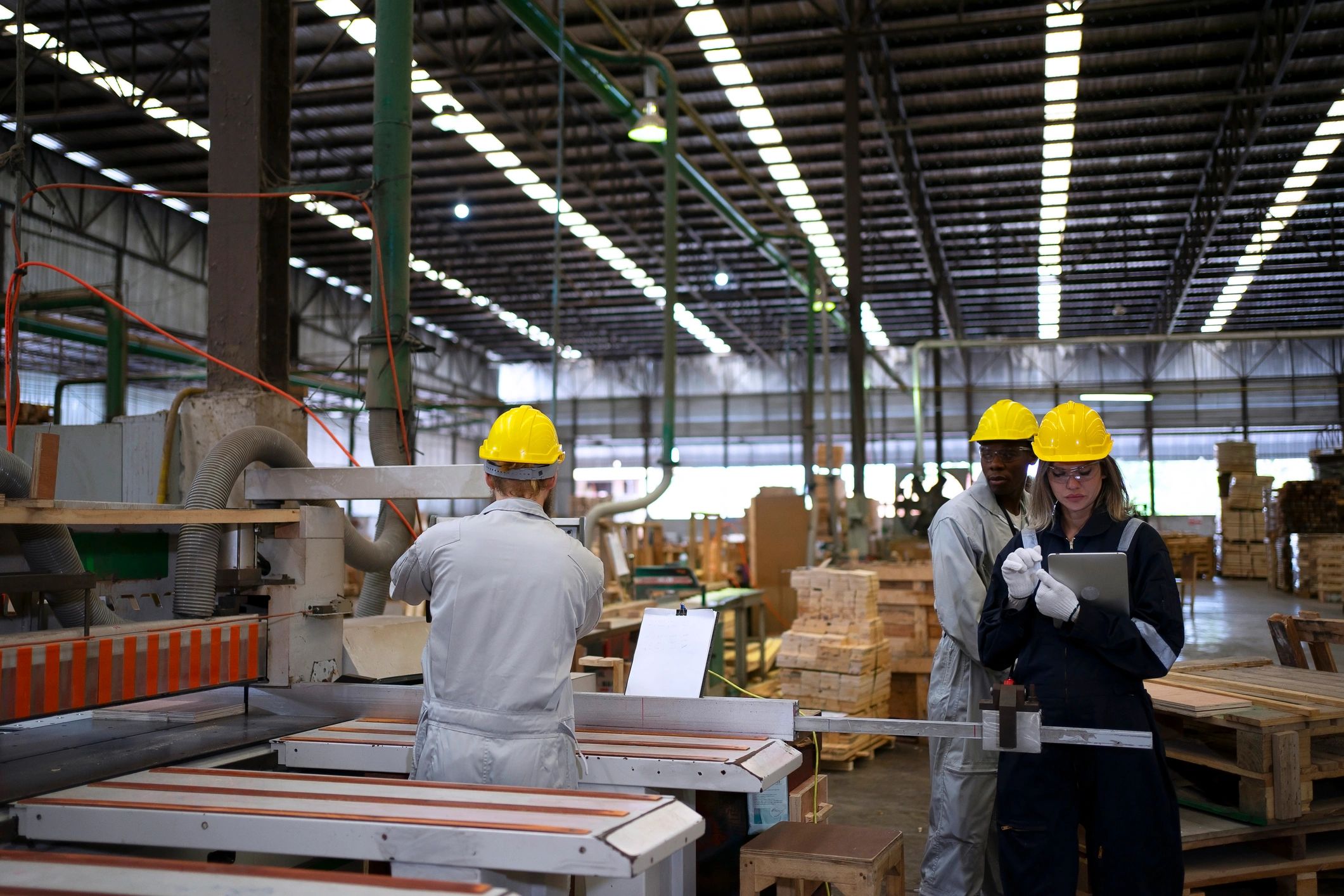 Manufacturing team working in a factory environment